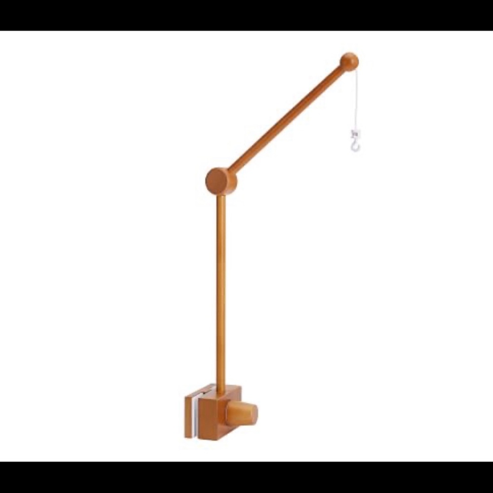 Pottery Barn crib mobile arm in chocolate brown.